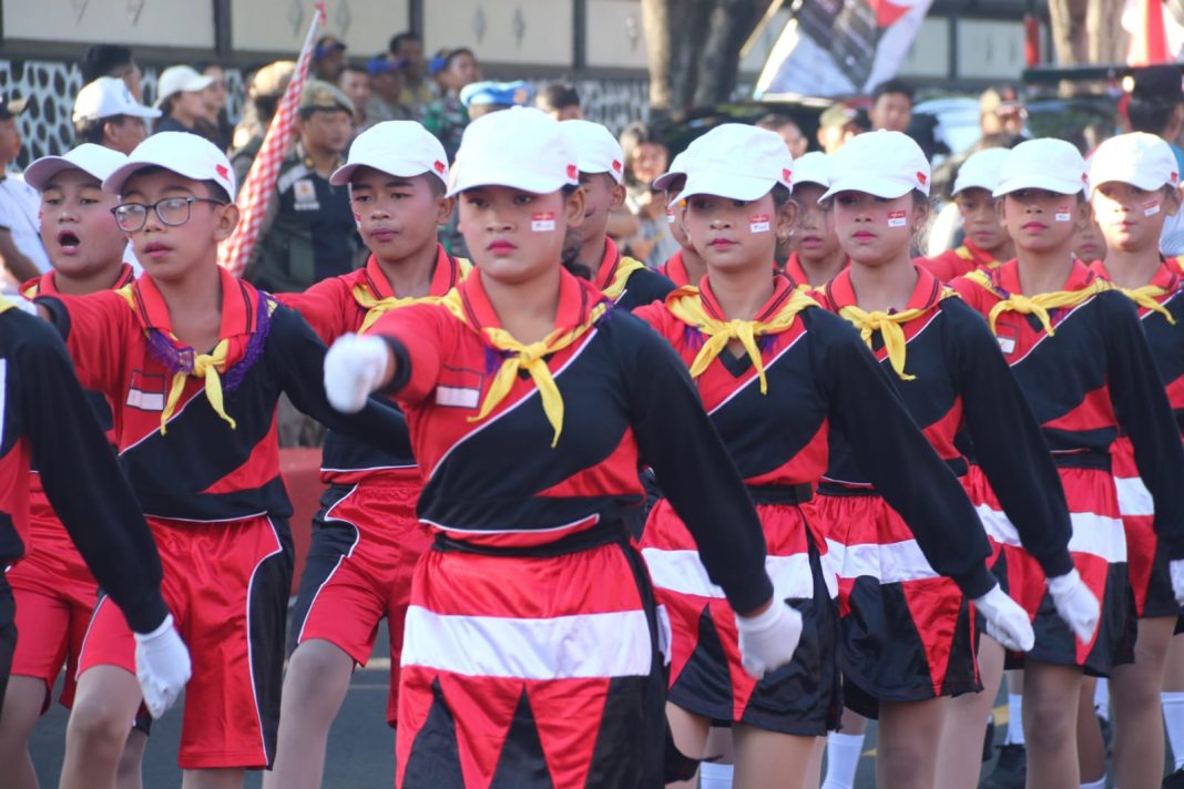 Pj. Lihadnyana Ajak Generasi Muda Bangkitkan Semangat Nasionalisme melalui Lomba Gerak Jalan